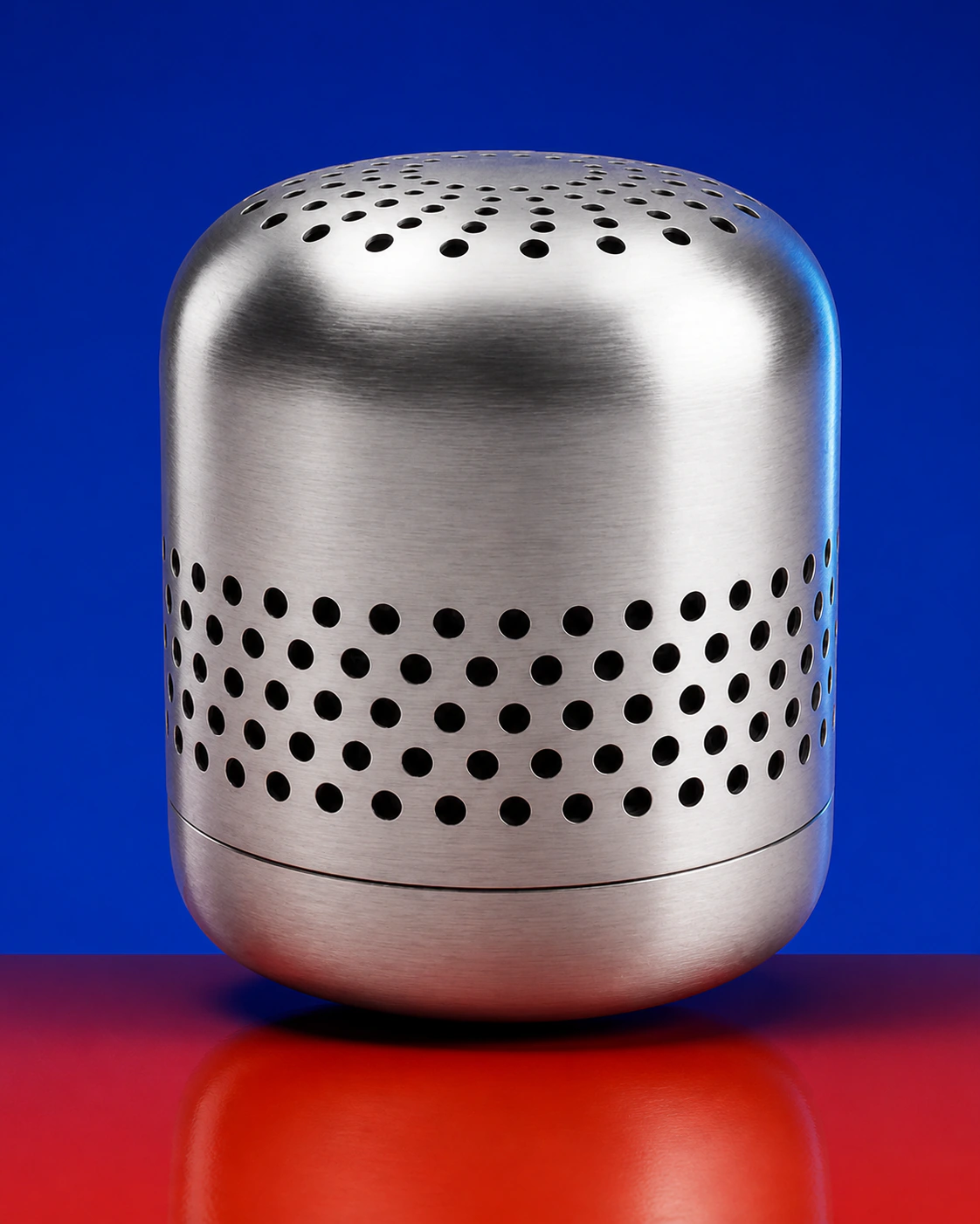 A compact brushed stainless steel refrigerator deodorizer